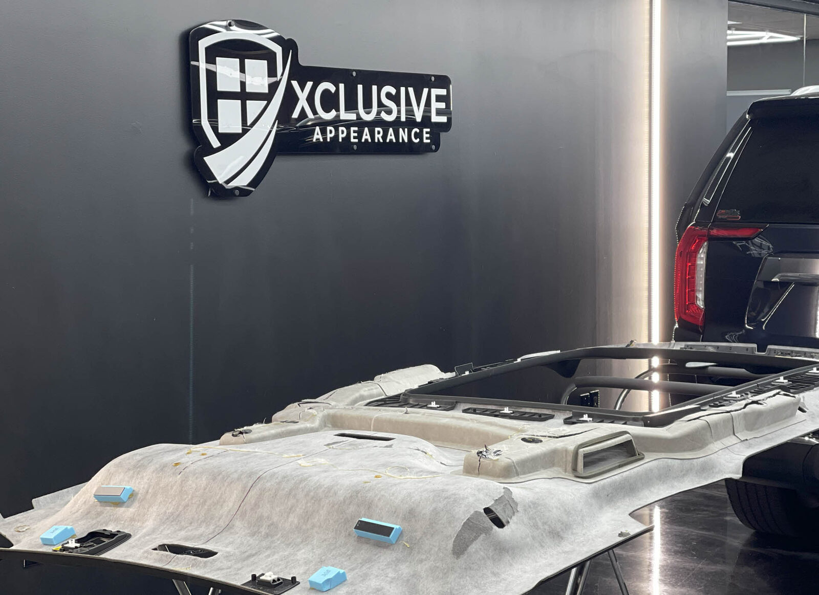 Headliner prepped for a starlight install in the Xclusive Appearance shop