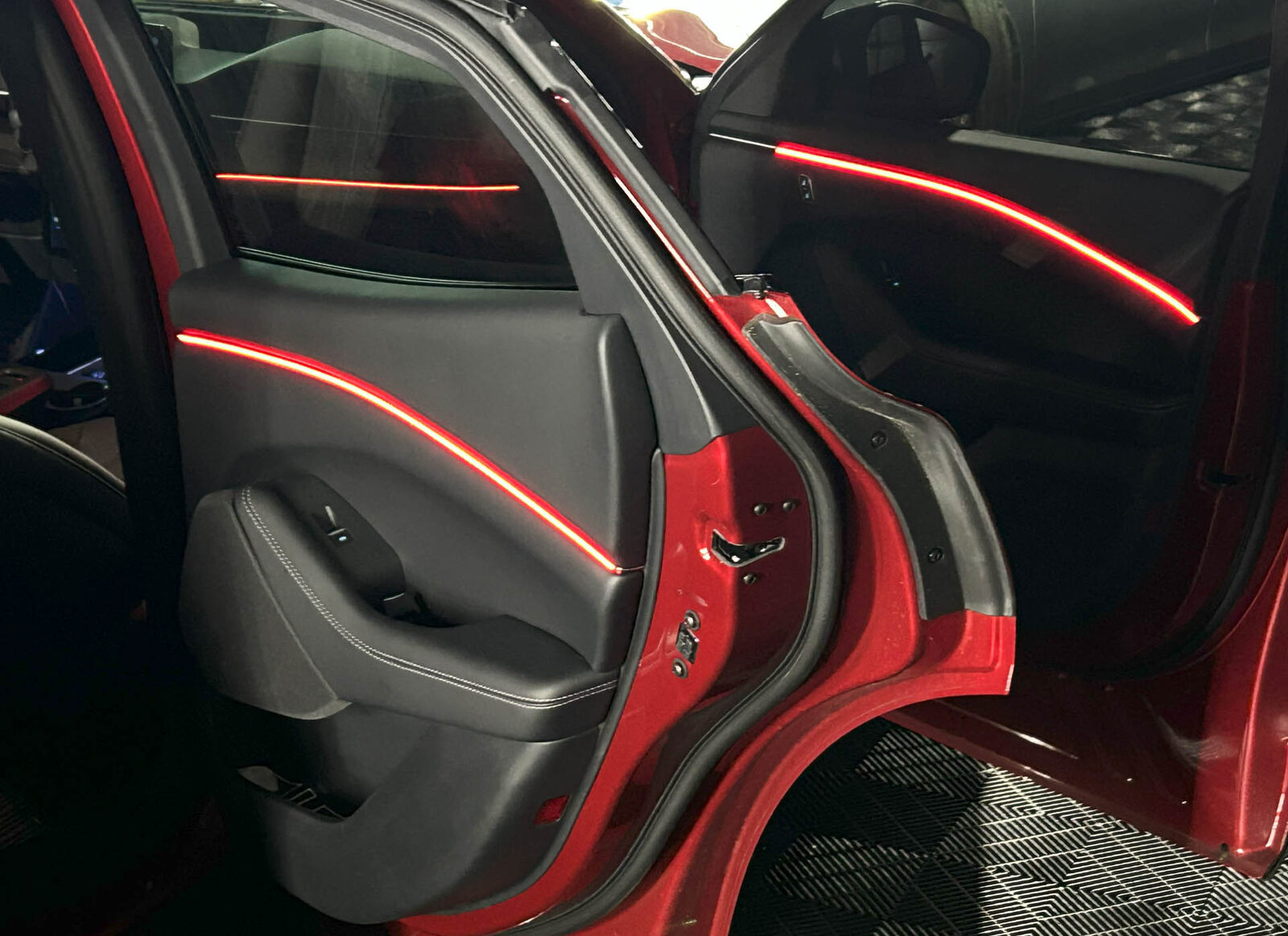 Rear doors with red ambient light strips installed