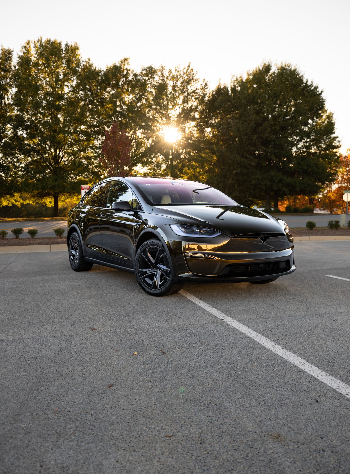 Black Tesla Model X with paint protection film at sunset, Lawrenceville GA