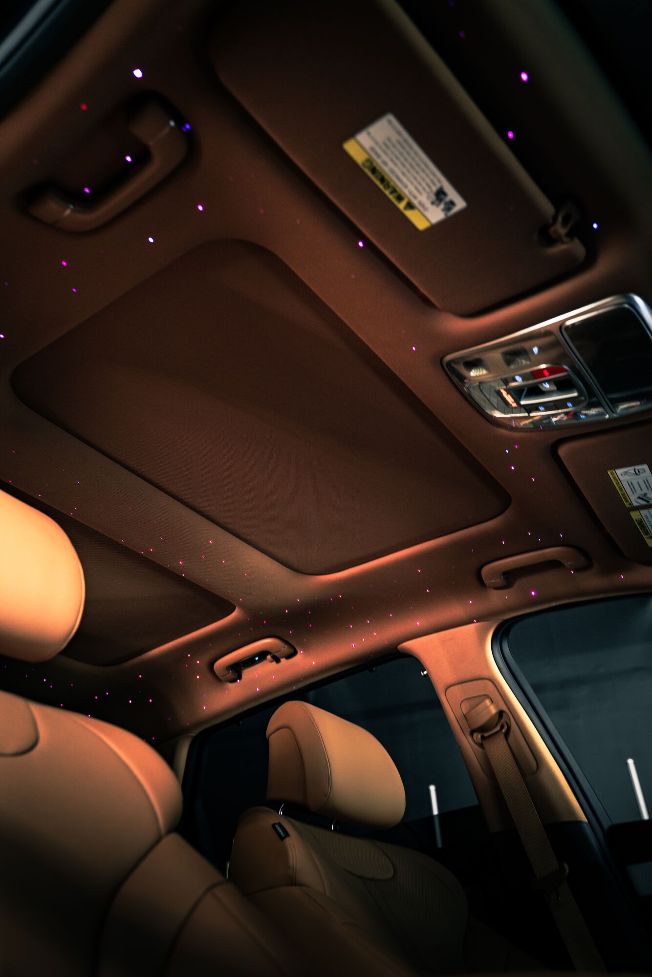 Fiber-optic starlight headliner detail in a Genesis GV80