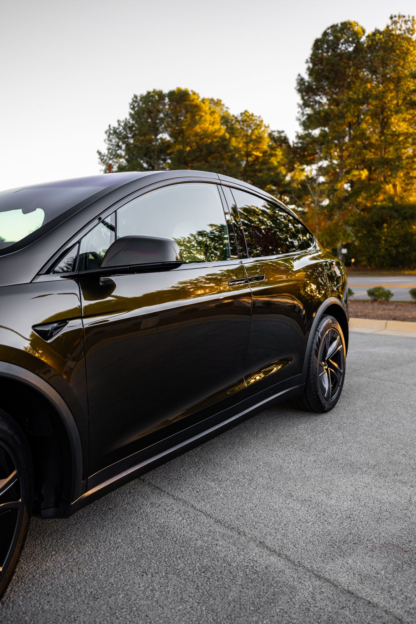 Side profile of a Tesla Model X after paint protection film