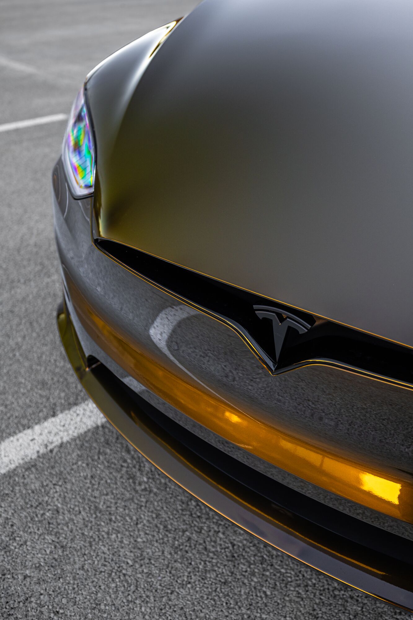 Close-up of a Tesla Model X hood and light bar after PPF